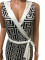 Deep V-neck fashionable and sexy batch printed jumpsuit
