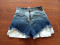 High denim shorts with multiple pockets and gradient colors