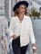 Fashion lapel single breasted loose fitting long sleeved shirt