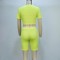 Fashion short sleeved hollowed out navel top with buttocks up shorts set