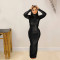 Fashionable solid color sexy long sleeved backless long dress