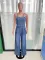 Fashionable casual and sexy denim jumpsuit with straps, wide leg pants, flared pants