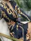 Fashionable printed long sleeved V-neck wrap hip short skirt