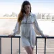 Sexy and fashionable long sleeved V-neck patchwork hollowed out satin high waisted short skirt