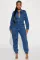 Fashionable streetwear with waistband for a slimming figure. Multi mouth bag with elastic waist, denim workwear jumpsuit