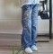 Autumn streetwear trendsetters with personalized printed straight leg pants, distressed mid rise jeans