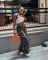 Fashionable women's camouflage workwear with multiple organ pockets and pants