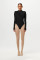 Sexy and fashionable jumpsuit with round neck and off shoulder patchwork, long sleeved solid color slim fit, versatile