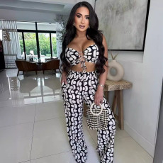 Two piece set of printed strap hollowed out suspender wide leg pants