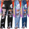 Sexy and fashionable burnt flower ripped jeans