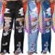 Sexy and fashionable burnt flower ripped jeans