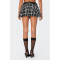 Fashionable and versatile classic plaid skirt with floral buds as the base