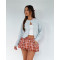 Fashionable and versatile classic plaid skirt with floral buds as the base