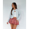 Fashionable and versatile classic plaid skirt with floral buds as the base