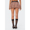 Fashionable and versatile classic plaid skirt with floral buds as the base
