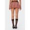 Fashionable and versatile classic plaid skirt with floral buds as the base