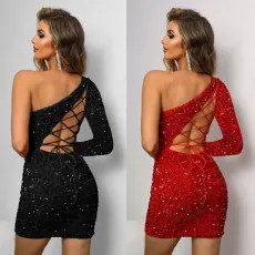 European and American sloping shoulder long sleeved tied hollow hip sequin dress