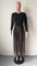 Solid color long sleeved European and American sexy tassel top