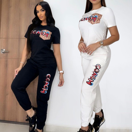 Explosive casual temperament two-piece set, high-end fashion pocket pants short sleeved set