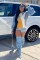 Fashionable loose sweater with color blocked patchwork jeans sleeves