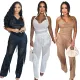 Neck tied sleeveless backless top paired with slim fit loose pants and sexy tassel two-piece set