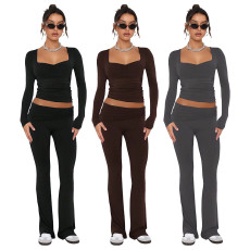 Solid color fashion low neck long sleeved sexy low waist flared pants two-piece set