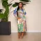Printed V-neck, inner waist buckle, outer waist belt, long sleeved dress, long skirt