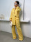 Fashionable women's lapel long sleeved shirt with elastic waist and patchwork pants legs striped set
