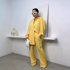 Fashionable women's lapel long sleeved shirt with elastic waist and patchwork pants legs striped set
