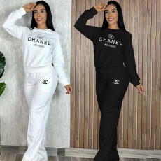 Fashionable and sexy long sleeved embossed set with embroidered pockets and wide legs, two-piece set