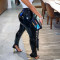 Women's button zipper hot selling hot selling, slit slim fit street shiny leather small foot leather pants