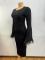Women's feather long sleeved dress with buttocks wrapped in a mid length skirt, exuding a high-end and slimming vibe