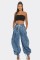 The rope can be pulled, the elastic waistband is pulled, the tie is tied, the bow is tied, and the loose and slimming jeans are women's casual pants