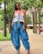 The rope can be pulled, the elastic waistband is pulled, the tie is tied, the bow is tied, and the loose and slimming jeans are women's casual pants