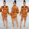 Fashionable and sexy solid color long sleeved hollow pleated mid skirt dress