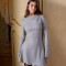 Hot selling new women's dress sexy round neck long sleeved slim fit A-line hip hugging short skirt