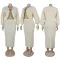 Two piece set of cardigan silhouette sweater with hip wrap skirt