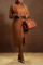 Two piece suit vest with a lapel, waist cinched, and slit design