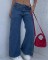 Fashionable design jeans sexy spicy girl zipper slit leopard print splicing high waist wide leg pants for women