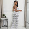 A sexy two-piece set of strapless top and loose pants