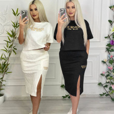 Fashionable temperament embossed embroidery slit short sleeved bag skirt set