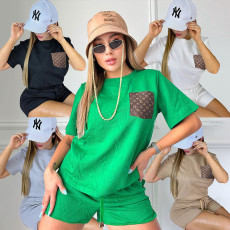 New casual women's pocket embossed short sleeved shorts set in 5 colors