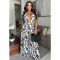 Fashionable women's casual sexy deep V-neck backless printed jumpsuit