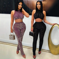 Two piece fashionable round neck sexy sleeveless short top paired with slim pencil pants