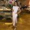 Solid color dress, fashionable round neck sleeveless slit, irregular slim fit long skirt