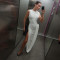 Solid color dress, fashionable round neck sleeveless slit, irregular slim fit long skirt