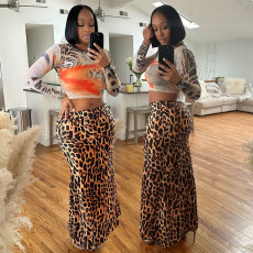 Fashion long sleeved round neck top paired with hip hugging slim half skirt two-piece set for women
