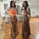 Fashion long sleeved round neck top paired with hip hugging slim half skirt two-piece set for women