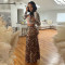 Fashion long sleeved round neck top paired with hip hugging slim half skirt two-piece set for women