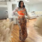 Fashion long sleeved round neck top paired with hip hugging slim half skirt two-piece set for women